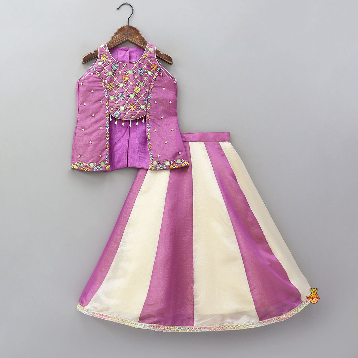 Pre Order: Stylish Front Cut Shimmery Top And Dual Tone Panel Lehenga