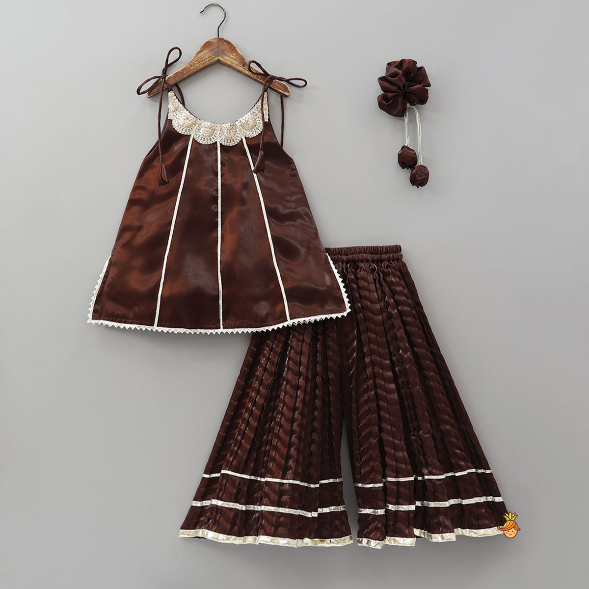Pre Order: Sleeveless Sheen Kurti And Crushed Fabric Palazzo With Hair Tie