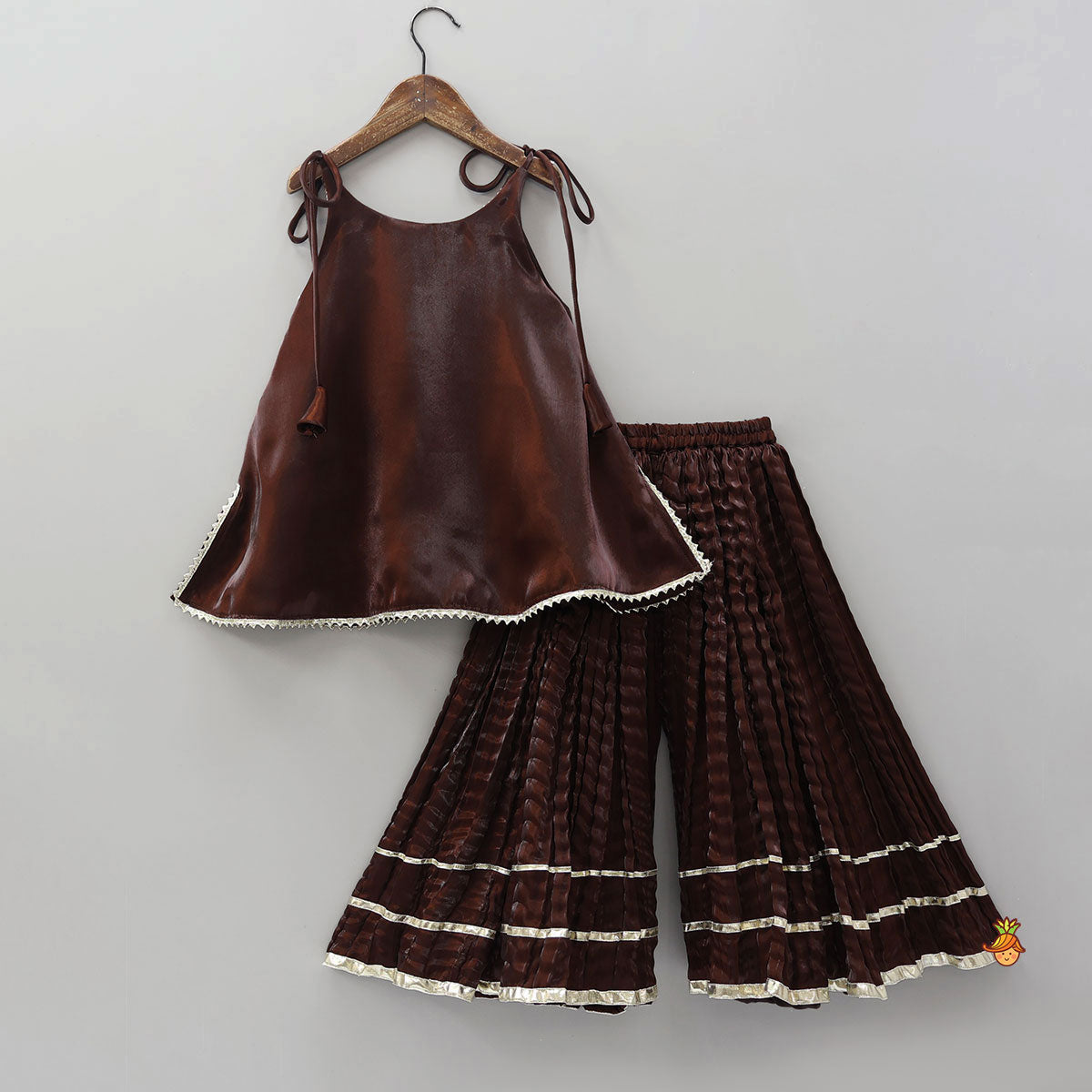 Pre Order: Sleeveless Sheen Kurti And Crushed Fabric Palazzo With Hair Tie