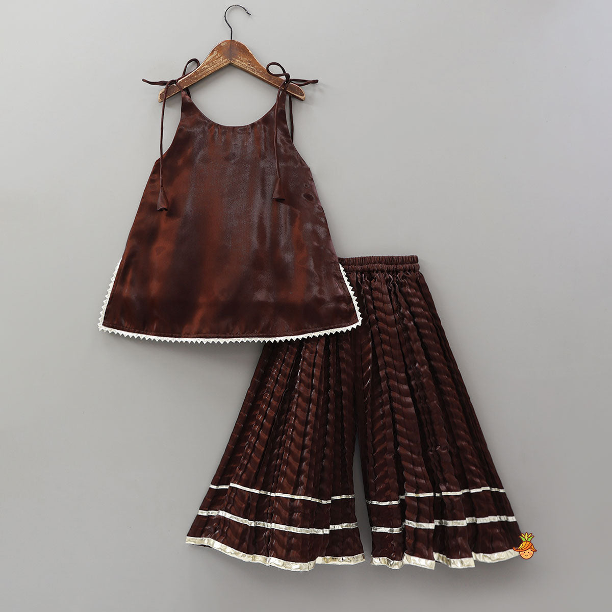 Pre Order: Sleeveless Sheen Kurti And Crushed Fabric Palazzo With Hair Tie