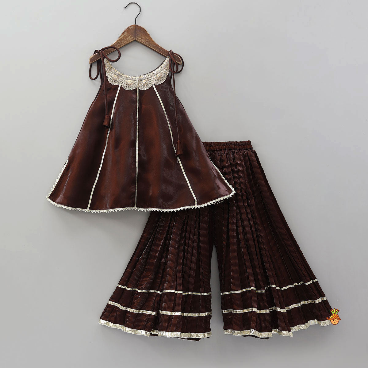 Pre Order: Sleeveless Sheen Kurti And Crushed Fabric Palazzo With Hair Tie