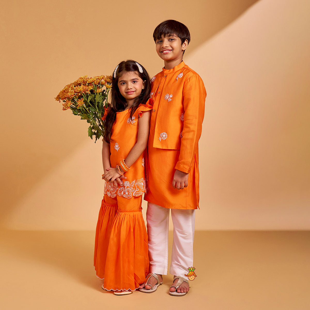 Floral Embroidered Kurti With Sharara And Dupatta twinning model image 1