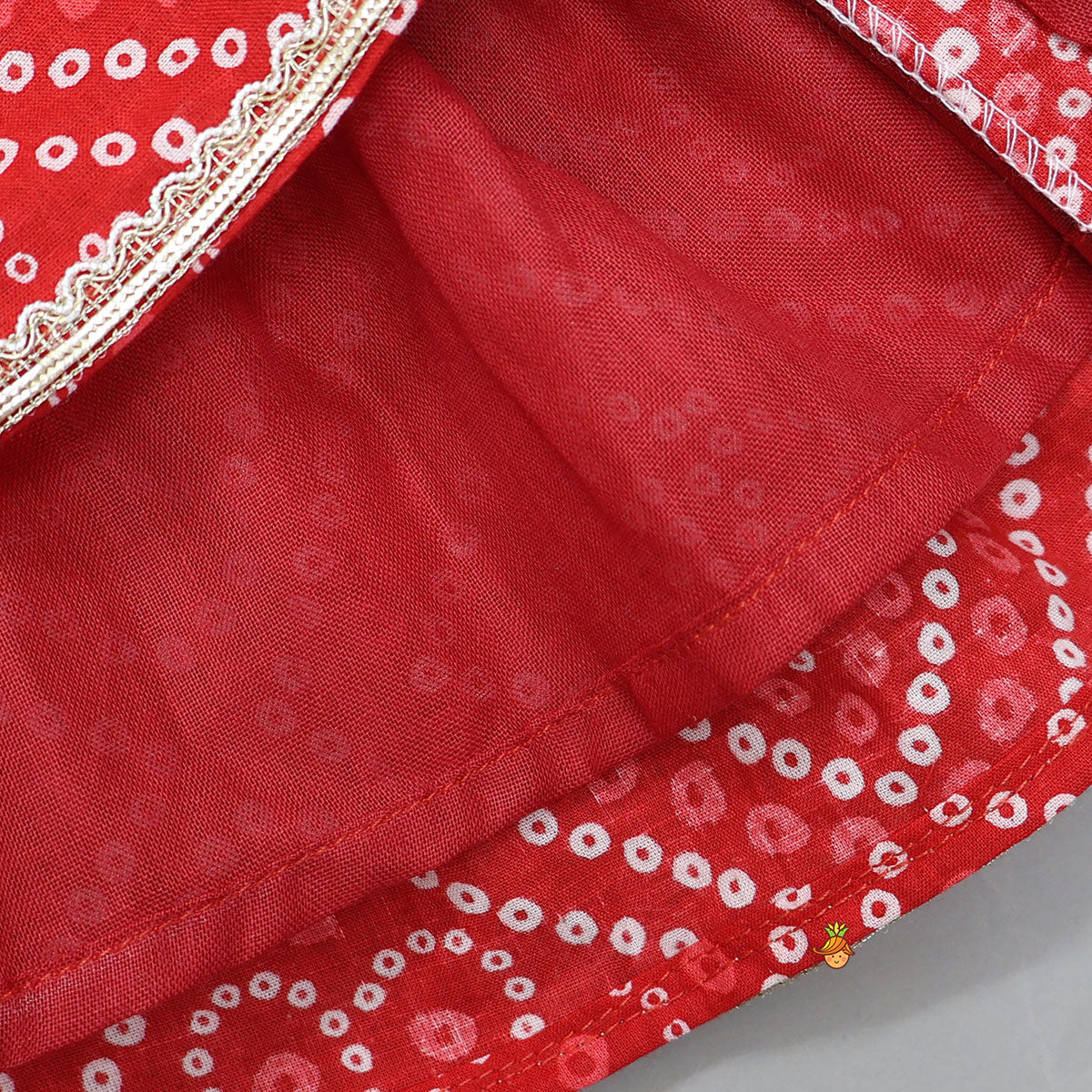 Pre Order: Bandhani Printed Angarkha Style Kurti With Cap Mittens And Booties