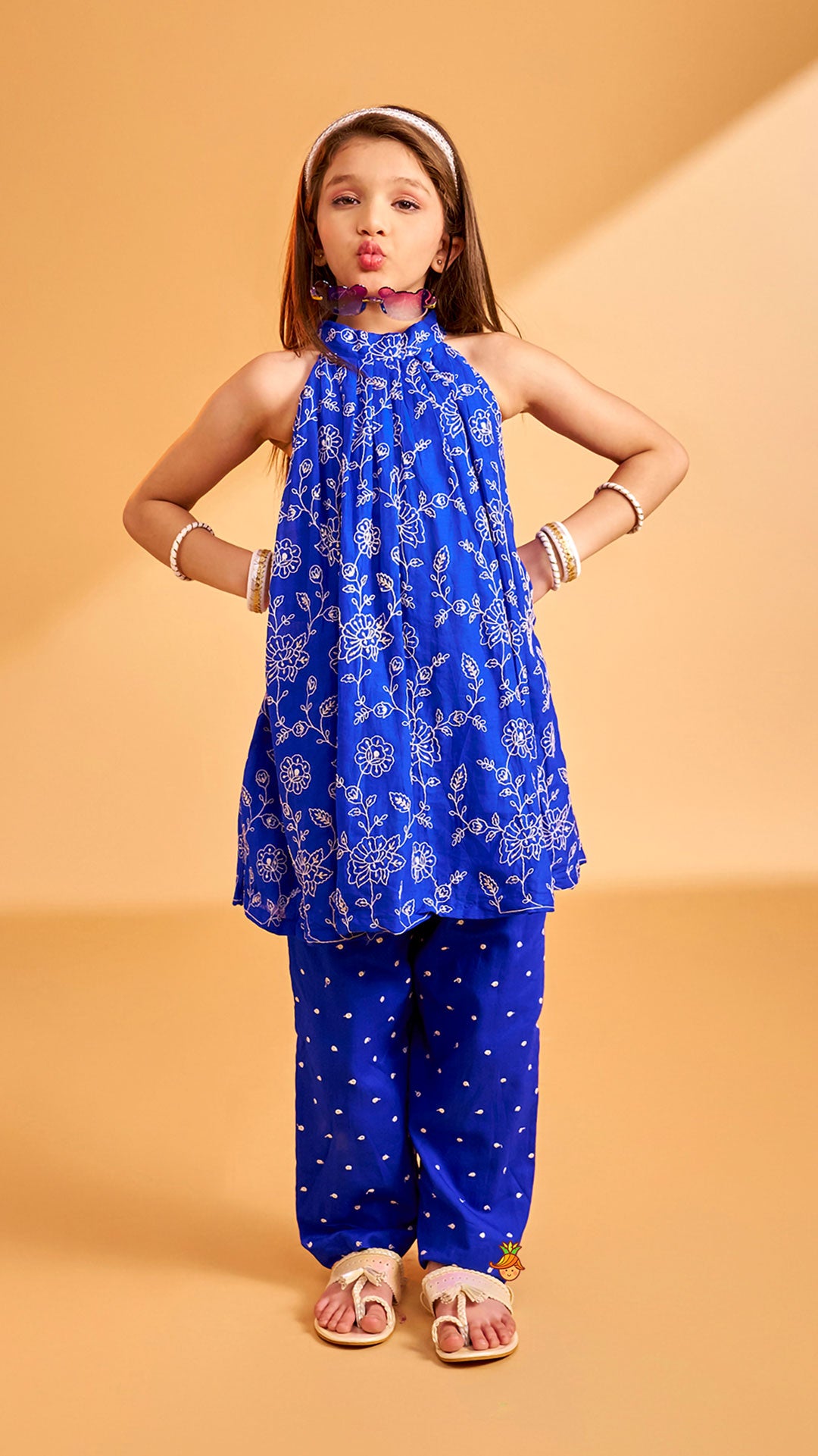 Pre Order: Thread Embroidered Flared Kurti And Pant