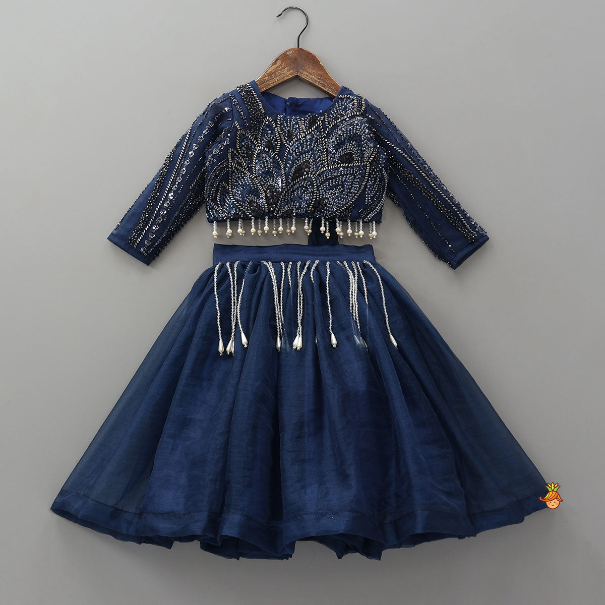 Pre Order: Heavy Embroidered Drape Crop Top And Lehenga With Matching Hair Band