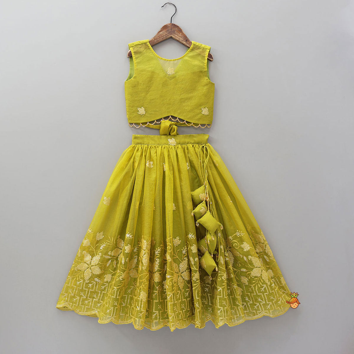 Pre Order: Organza Top And Lehenga With Handmade Tassel Detailing
