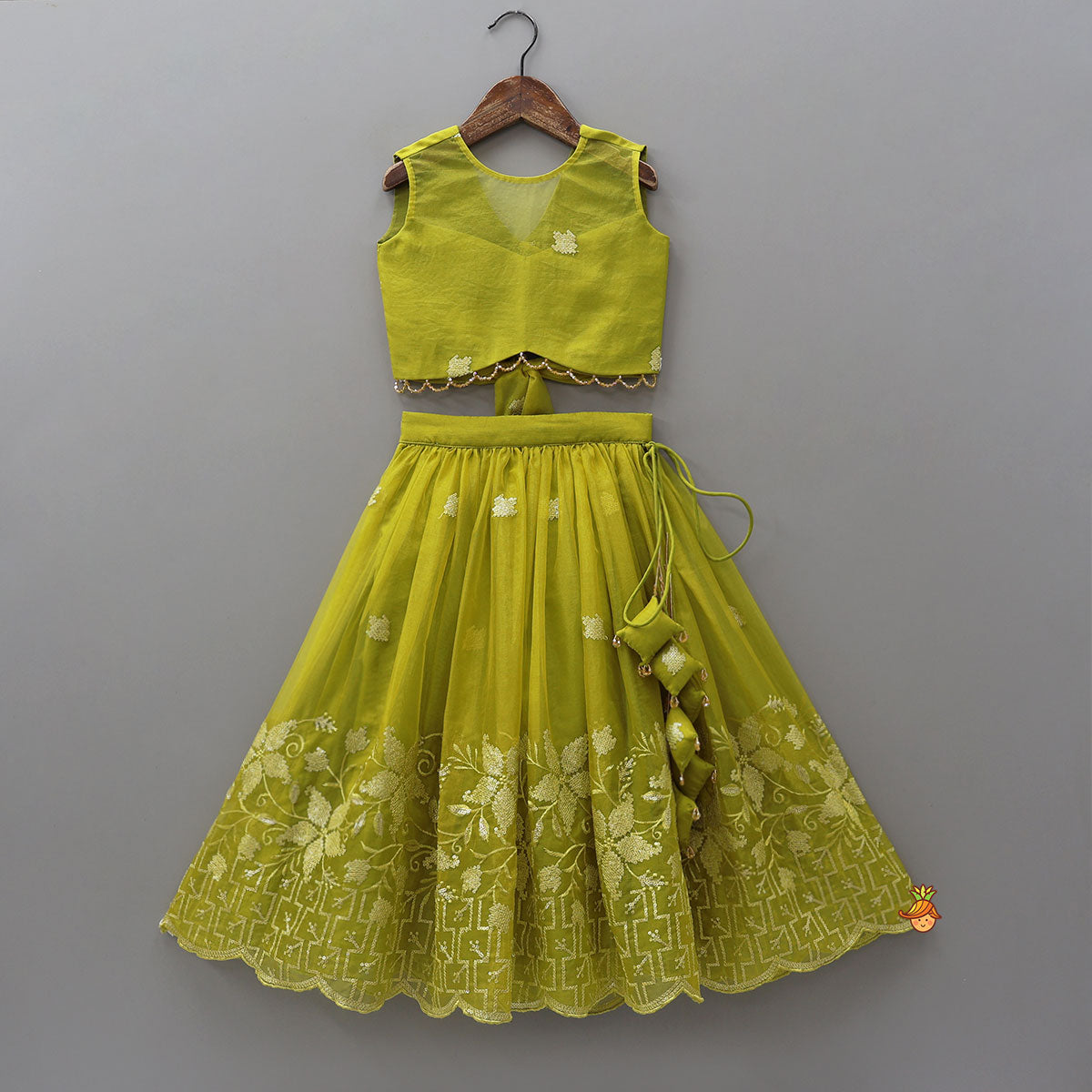 Pre Order: Organza Top And Lehenga With Handmade Tassel Detailing