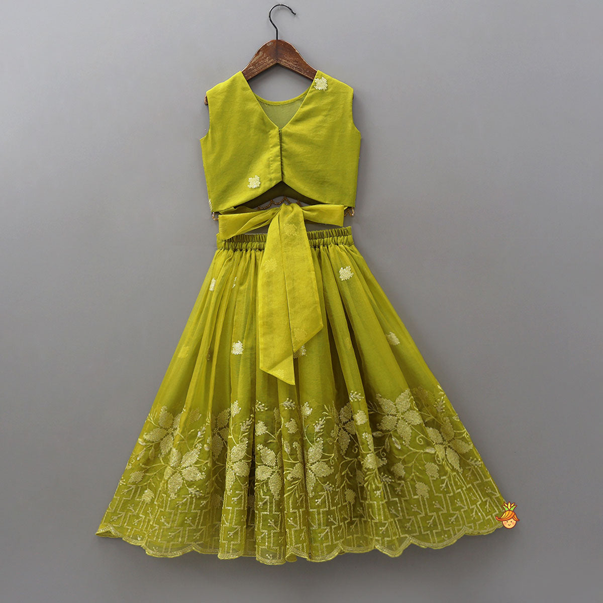 Pre Order: Organza Top And Lehenga With Handmade Tassel Detailing