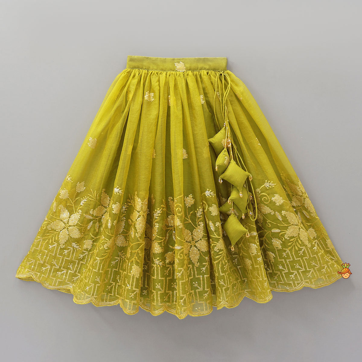 Pre Order: Organza Top And Lehenga With Handmade Tassel Detailing
