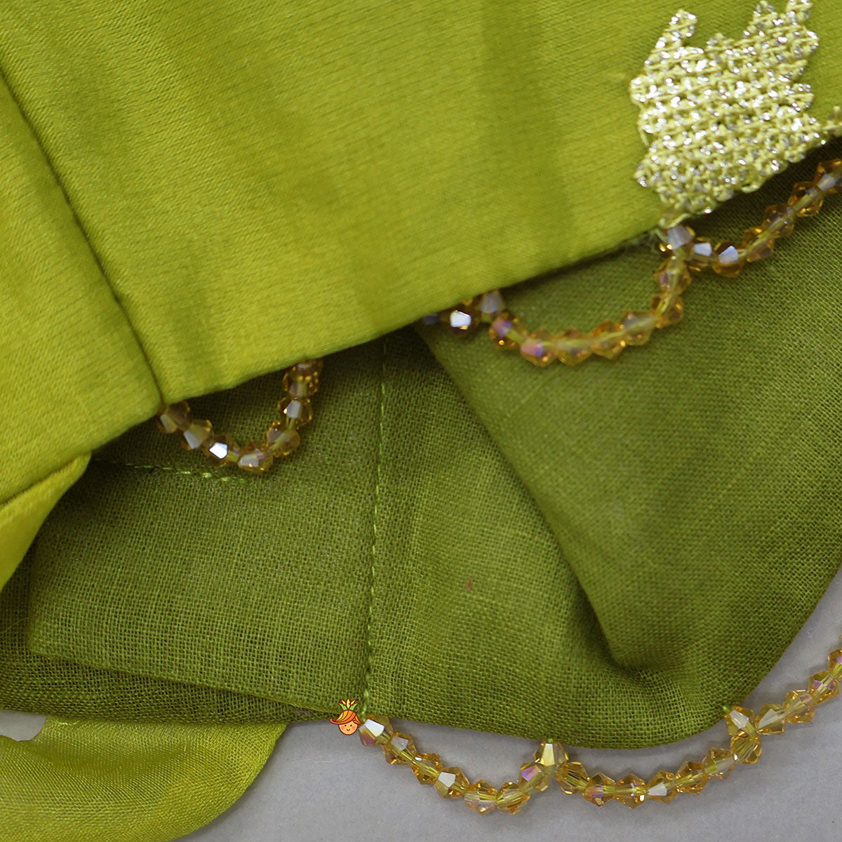 Pre Order: Organza Top And Lehenga With Handmade Tassel Detailing