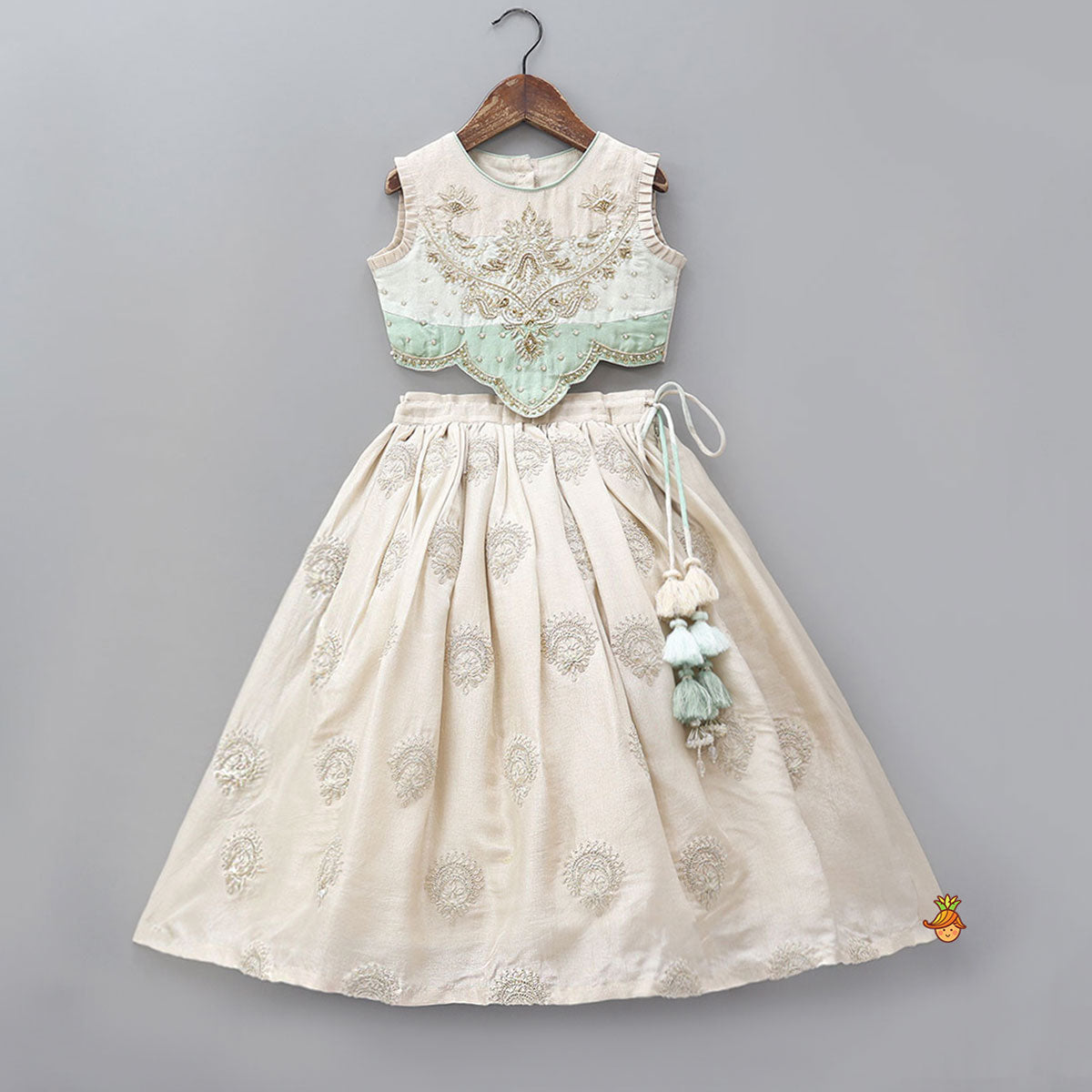 Pre Order: Hand Embroidered Pleated Armhole Top And Lehenga With Net Dupatta