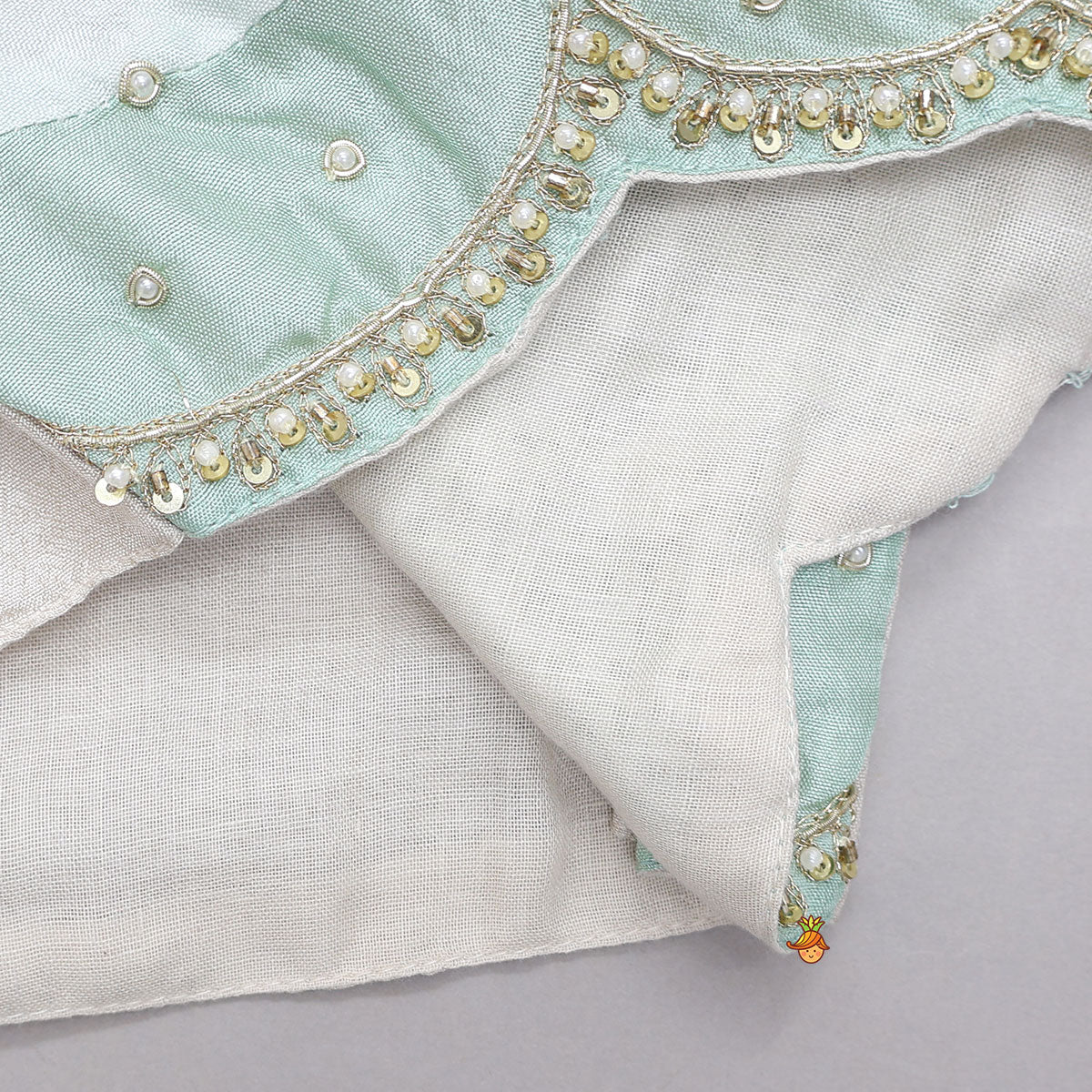 Pre Order: Hand Embroidered Pleated Armhole Top And Lehenga With Net Dupatta