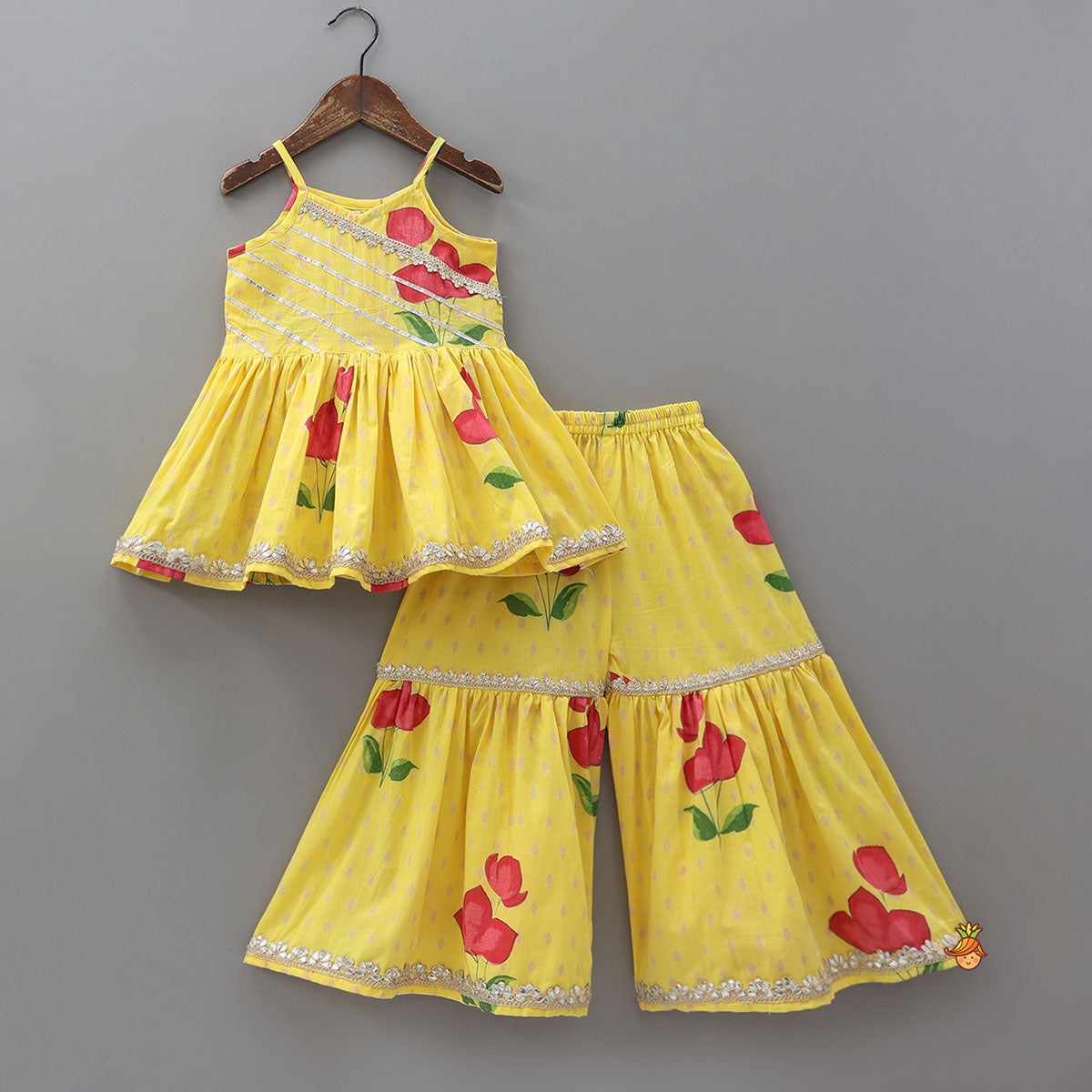 Pre Order: Vibrant Floral Strappy Peplum Top With Sharara And Dupatta