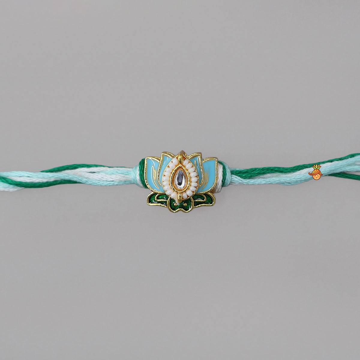 Cotton Thread Rakhi With Lotus Charm