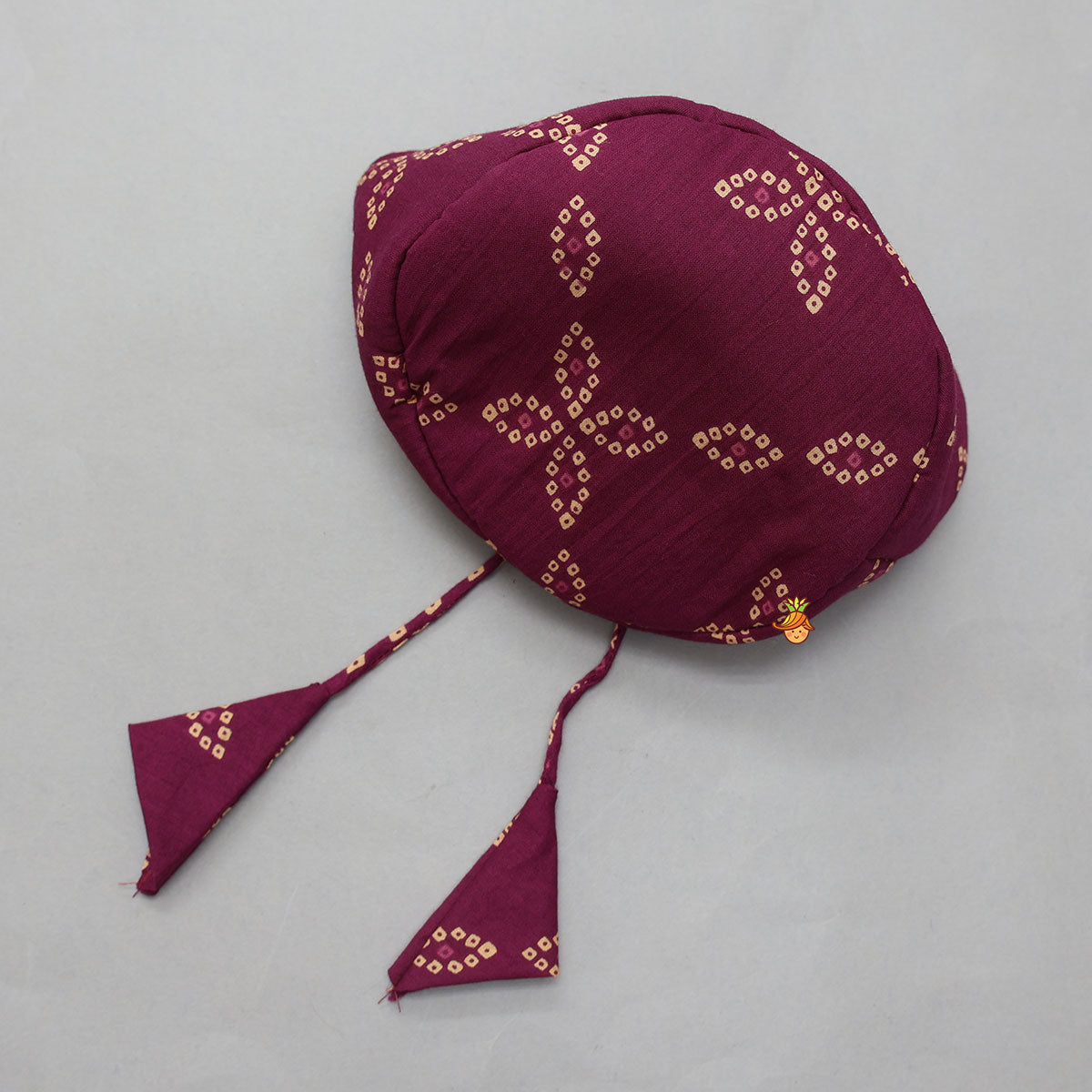 Bandhani Printed Kurta And Matching Dhoti With Cap And Booties