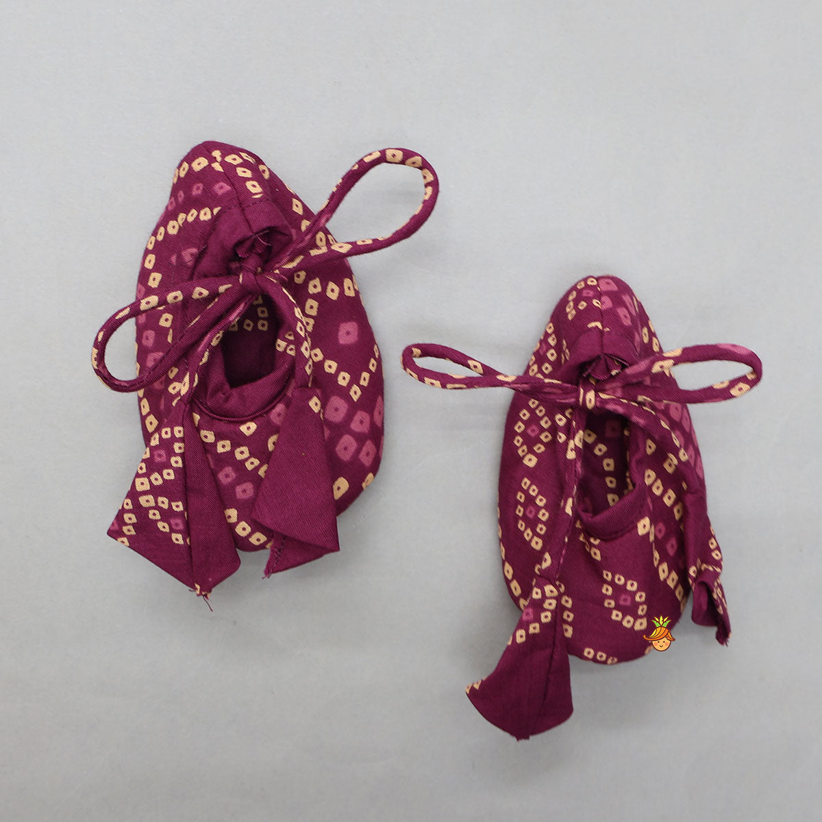 Bandhani Printed Kurta And Matching Dhoti With Cap And Booties