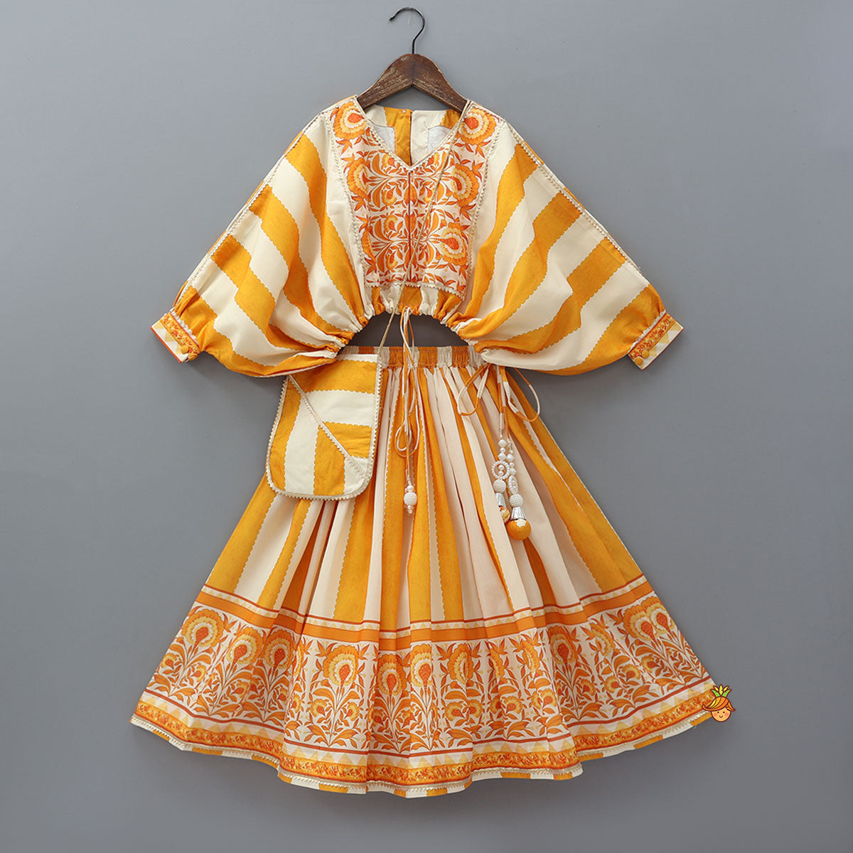 Pre Order: Kaftan Top And Lehenga With Matching Sling Bag