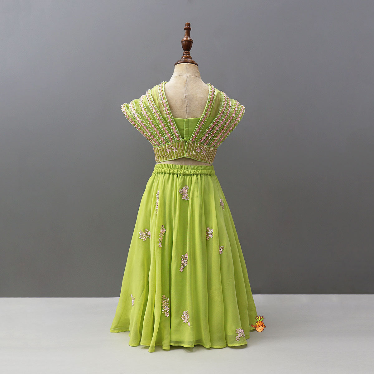 Pre Order: Top With Statement Cape And Floral Embroidered Flared Lehenga