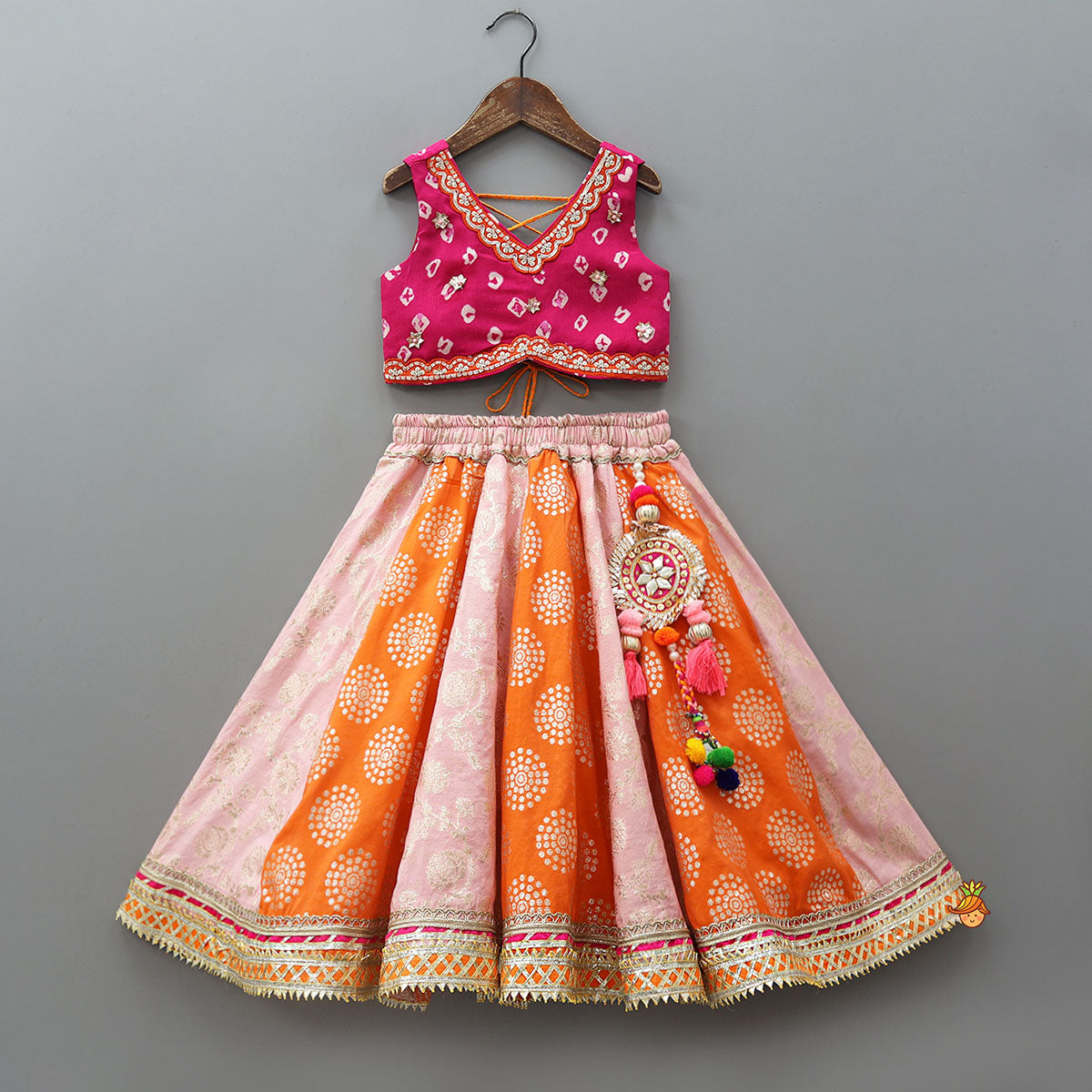 Pre Order: Criss-Cross Knot Tie-Up Crop Top And Lehenga With Sheen Dupatta