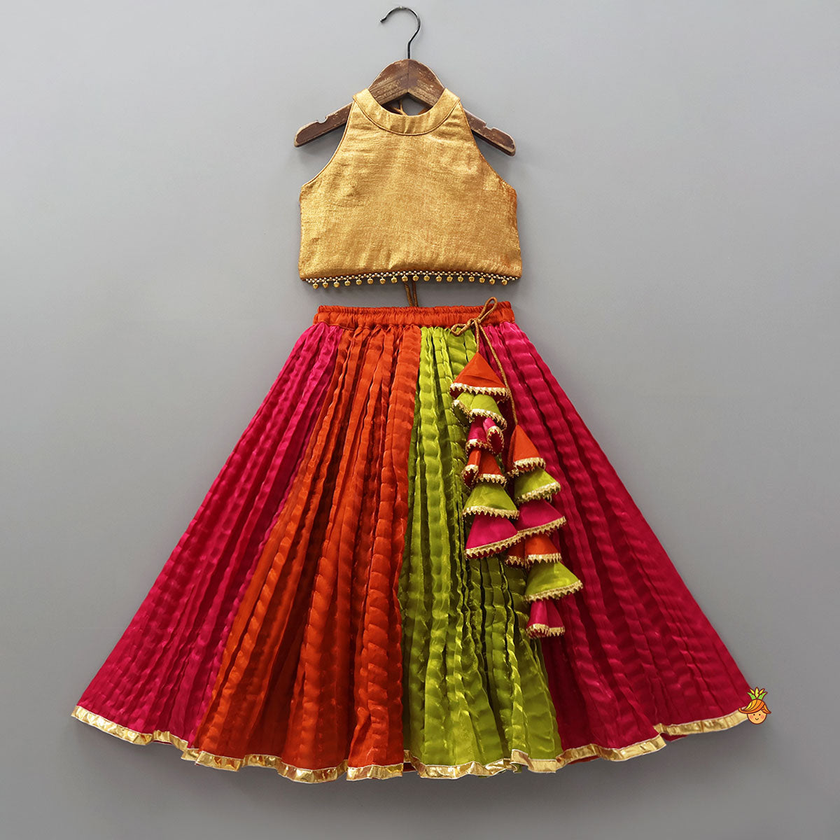 Pre Order: Sheen Finish Halter Neck Crop Top With Crushed Lehenga