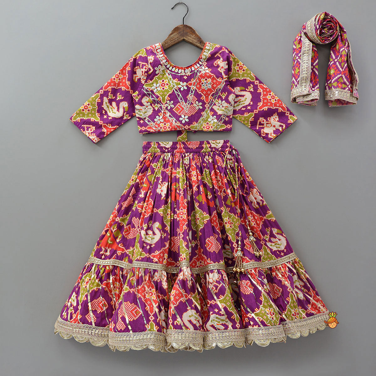 Pre Order: Patola Inspired Printed Crop Top With Flared Lehenga And Dupatta