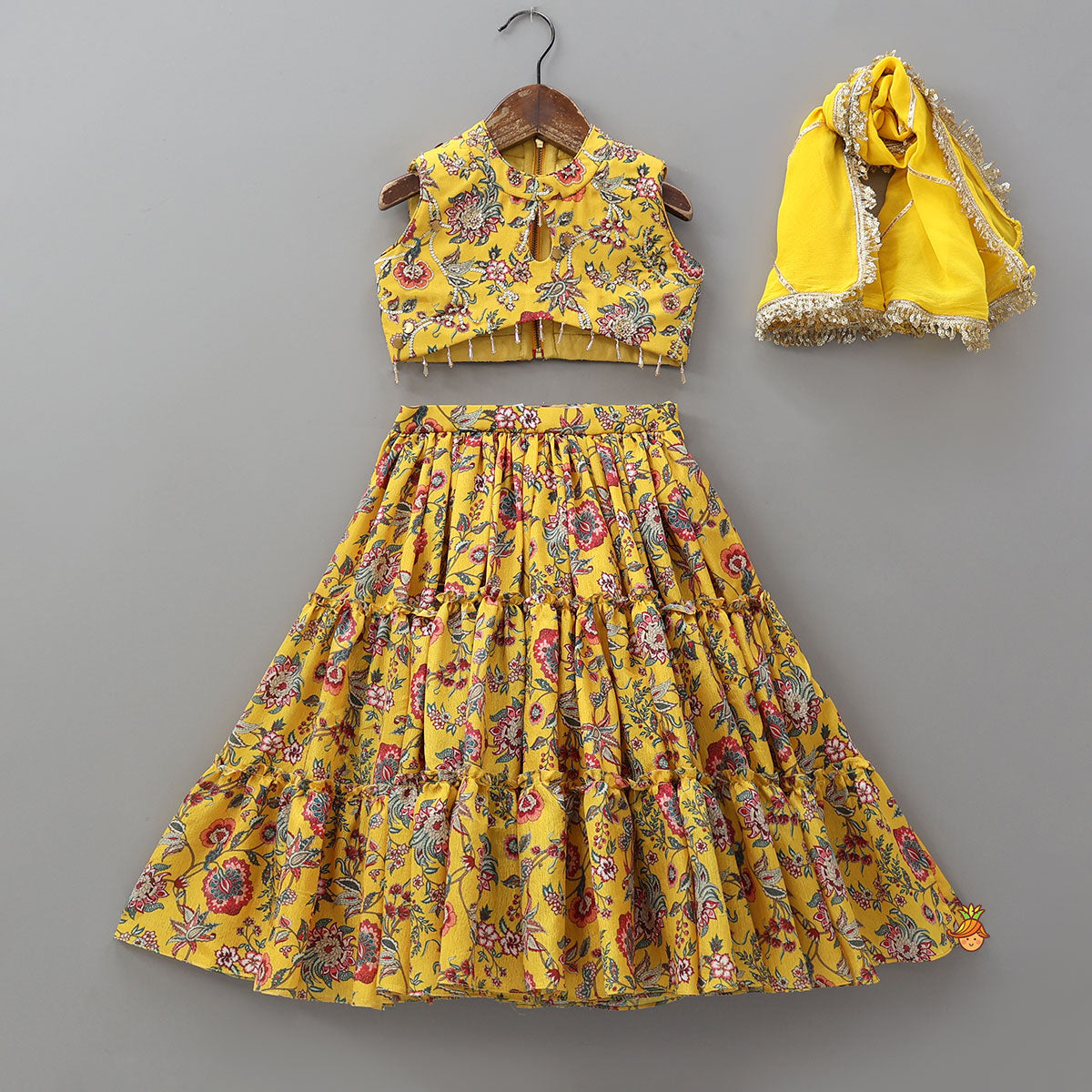 Pre Order: Beautiful Floral Printed Top With Tiered Lehenga And Dupatta
