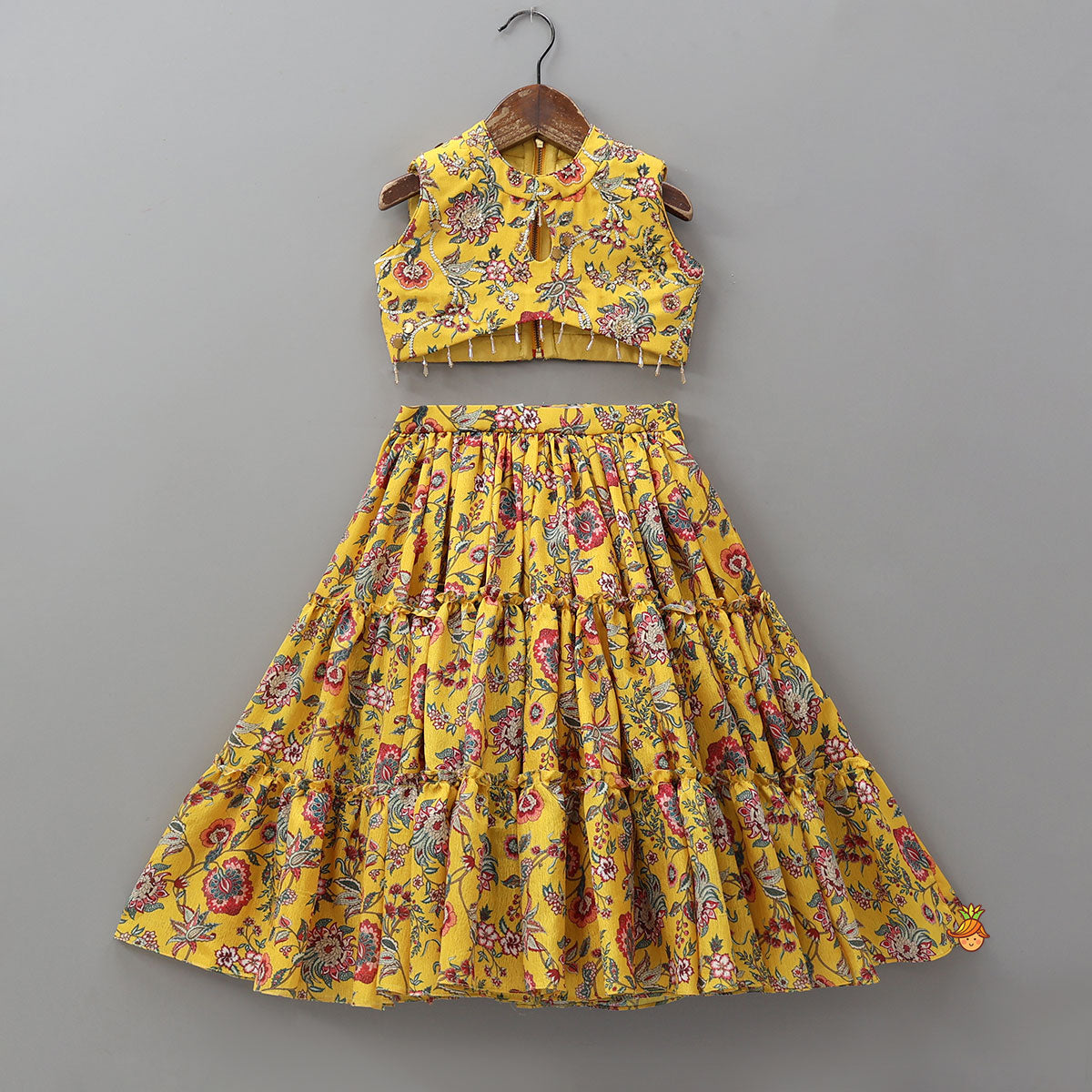 Pre Order: Beautiful Floral Printed Top With Tiered Lehenga And Dupatta