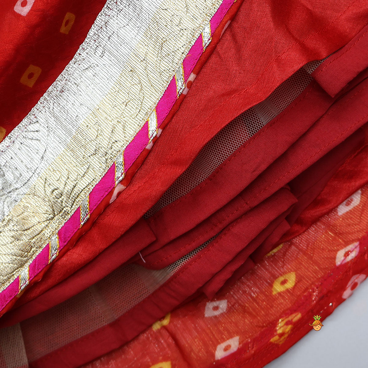 Pre Order: Stunning Crop Top And Tassel Detailed Bandhani Printed Sheen Lehenga With Dupatta