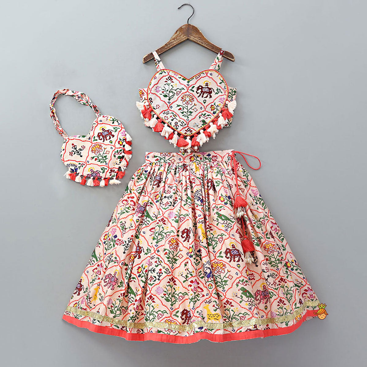 Pre Order: Heart Shaped Stylish Crop Top And Lehenga With Matching Bag