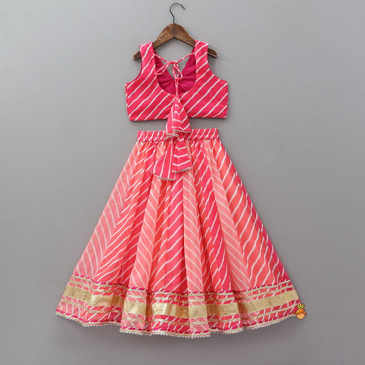 Pre Order: Vibrant Leheriya Printed Crop Top And Lehenga With Dupatta