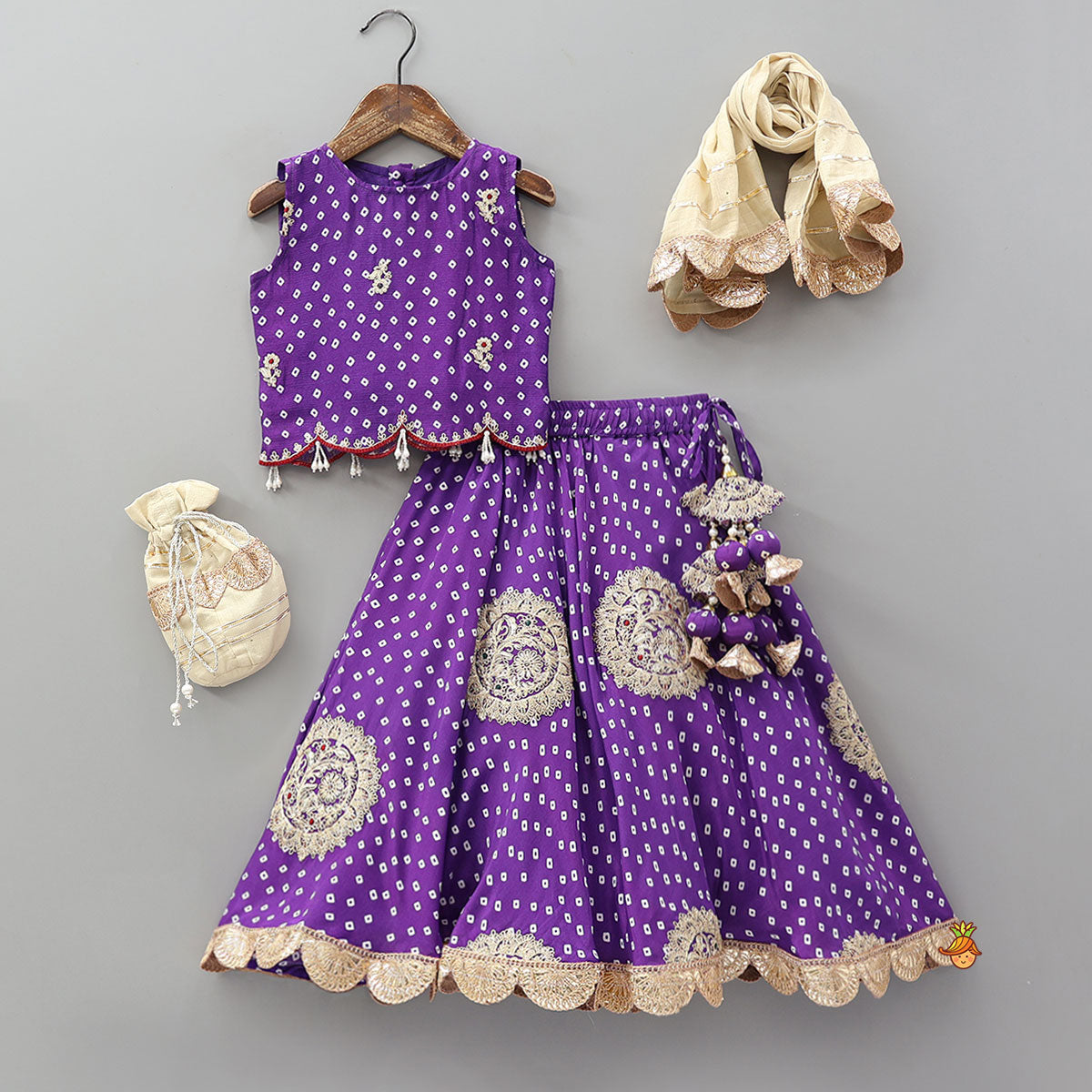 Pre Order: Bandhani Printed Crop Top And Embroidered Lehenga With Dupatta And Potli Bag