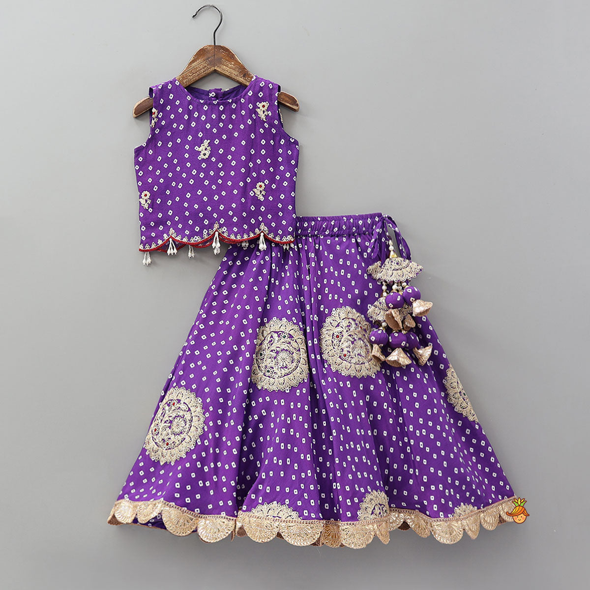 Pre Order: Bandhani Printed Crop Top And Embroidered Lehenga With Dupatta And Potli Bag