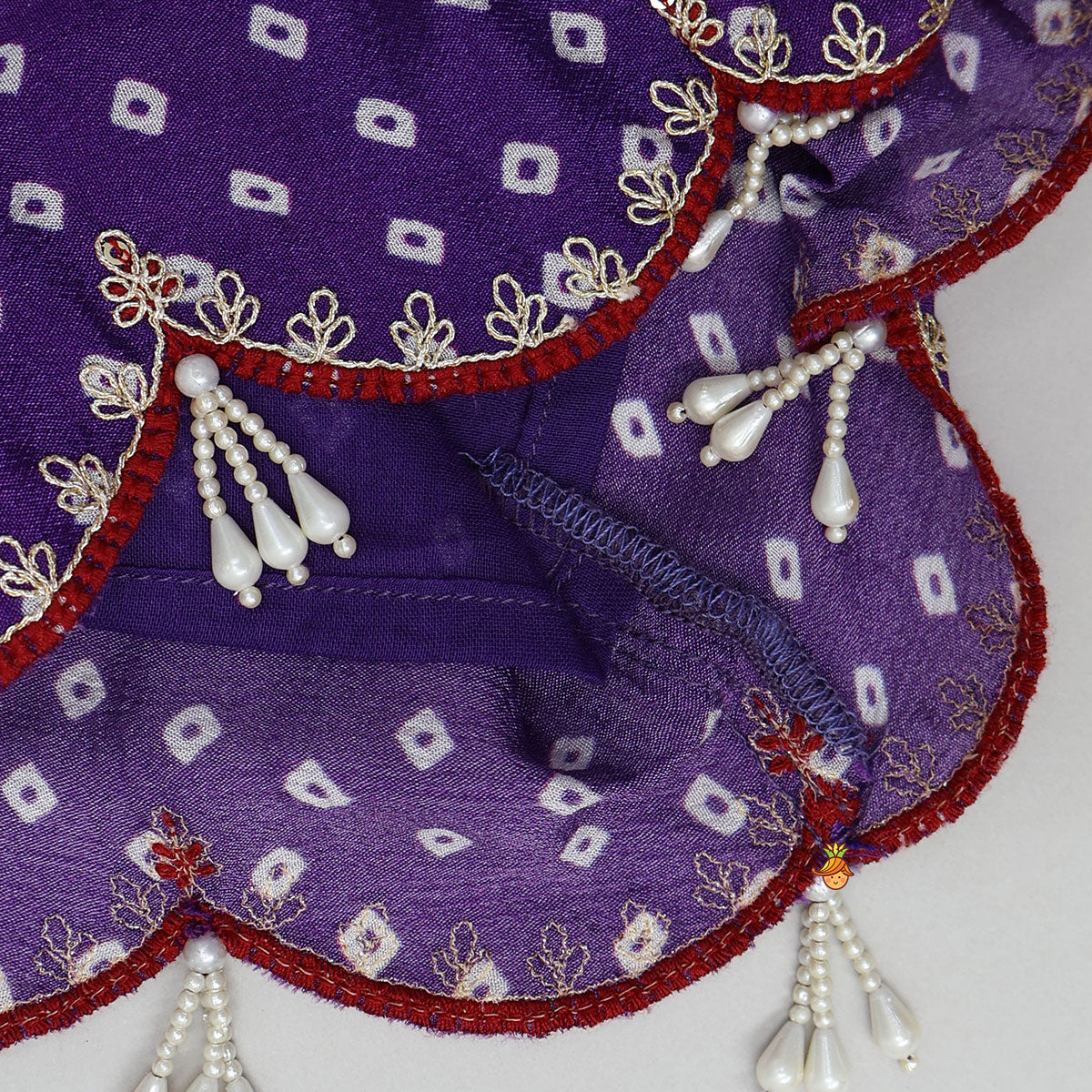 Pre Order: Bandhani Printed Crop Top And Embroidered Lehenga With Dupatta And Potli Bag