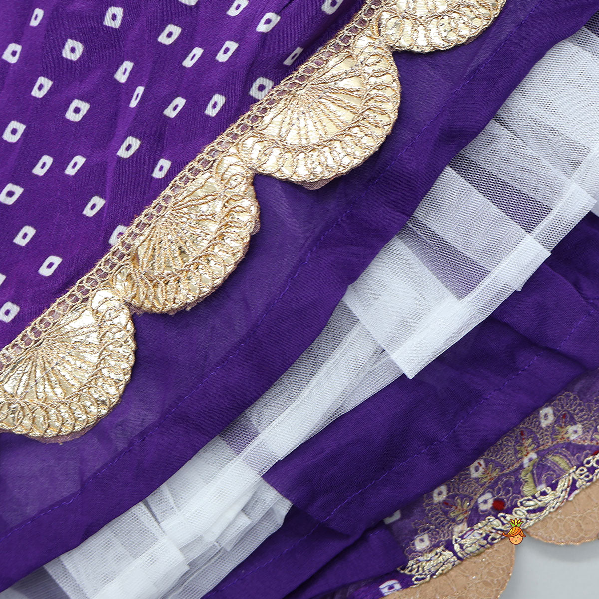 Pre Order: Bandhani Printed Crop Top And Embroidered Lehenga With Dupatta And Potli Bag