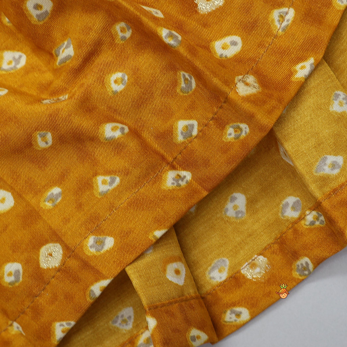 Pre Order: Box Pleated Bandhani Printed Ethnic Kurti And Stylish Pant With Potli Bag