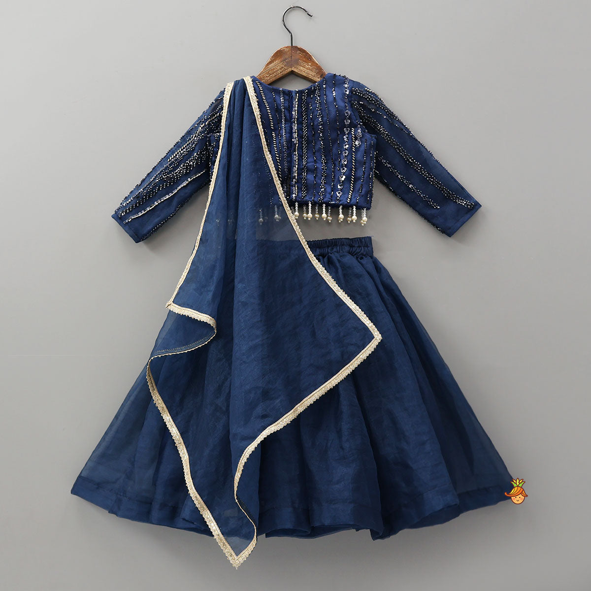 Pre Order: Heavy Embroidered Drape Crop Top And Lehenga With Matching Hair Band