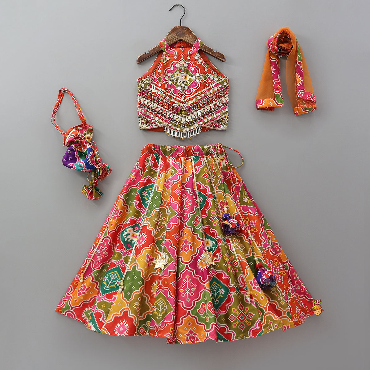 Pre Order: Halter Neck Heavily Embroidered Top And Lehenga With Dupatta And Potli Bag