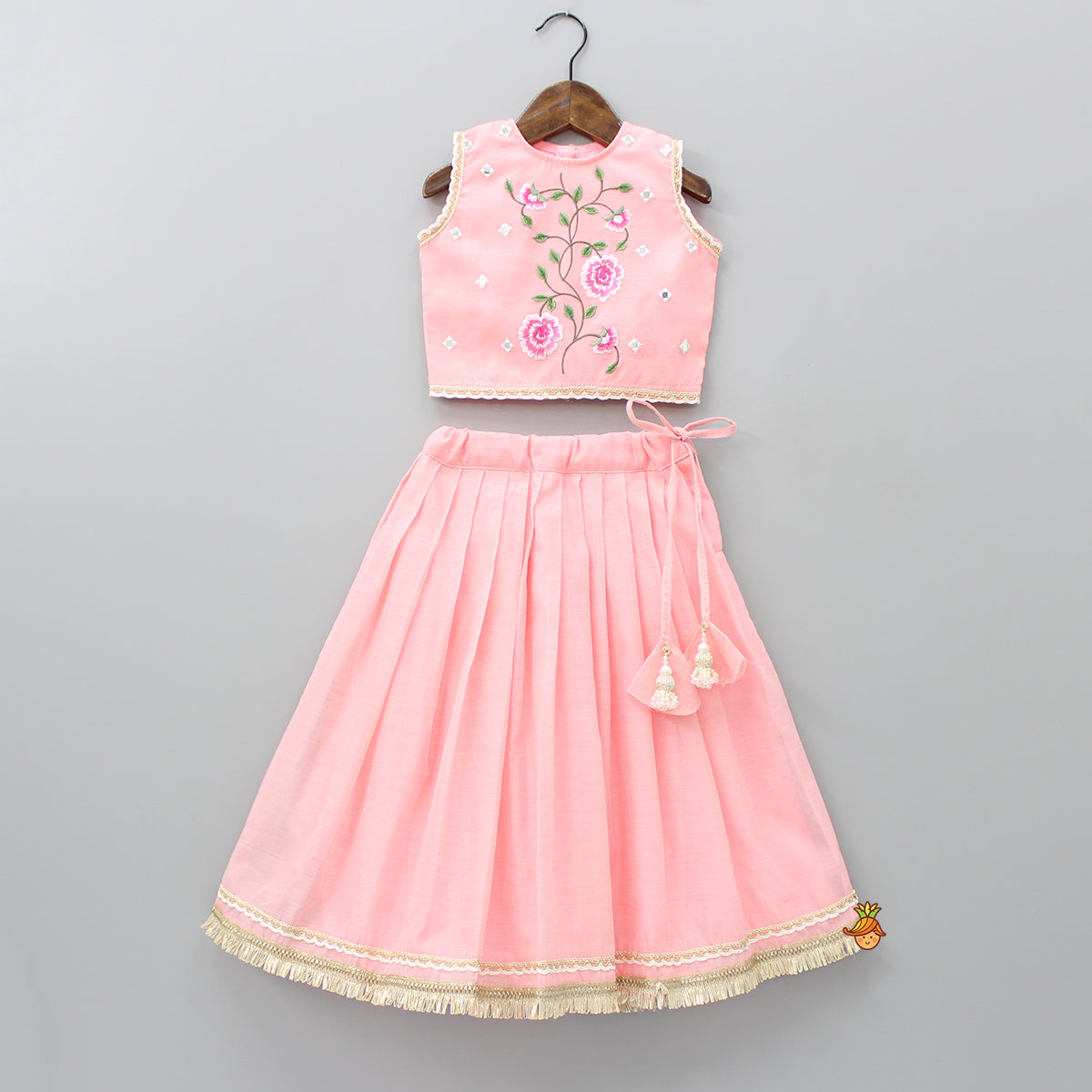 Pre Order: Peach Pink Mirror Work Yoke Top And Pleated Lehenga