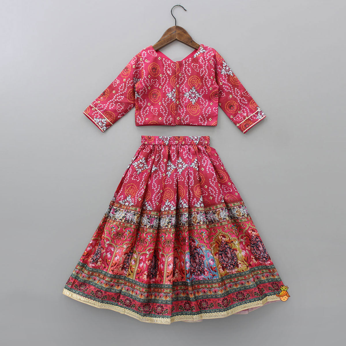 Chinon Bandhani Printed Pink Top And Pleated Lehenga With Lace Work Net Dupatta