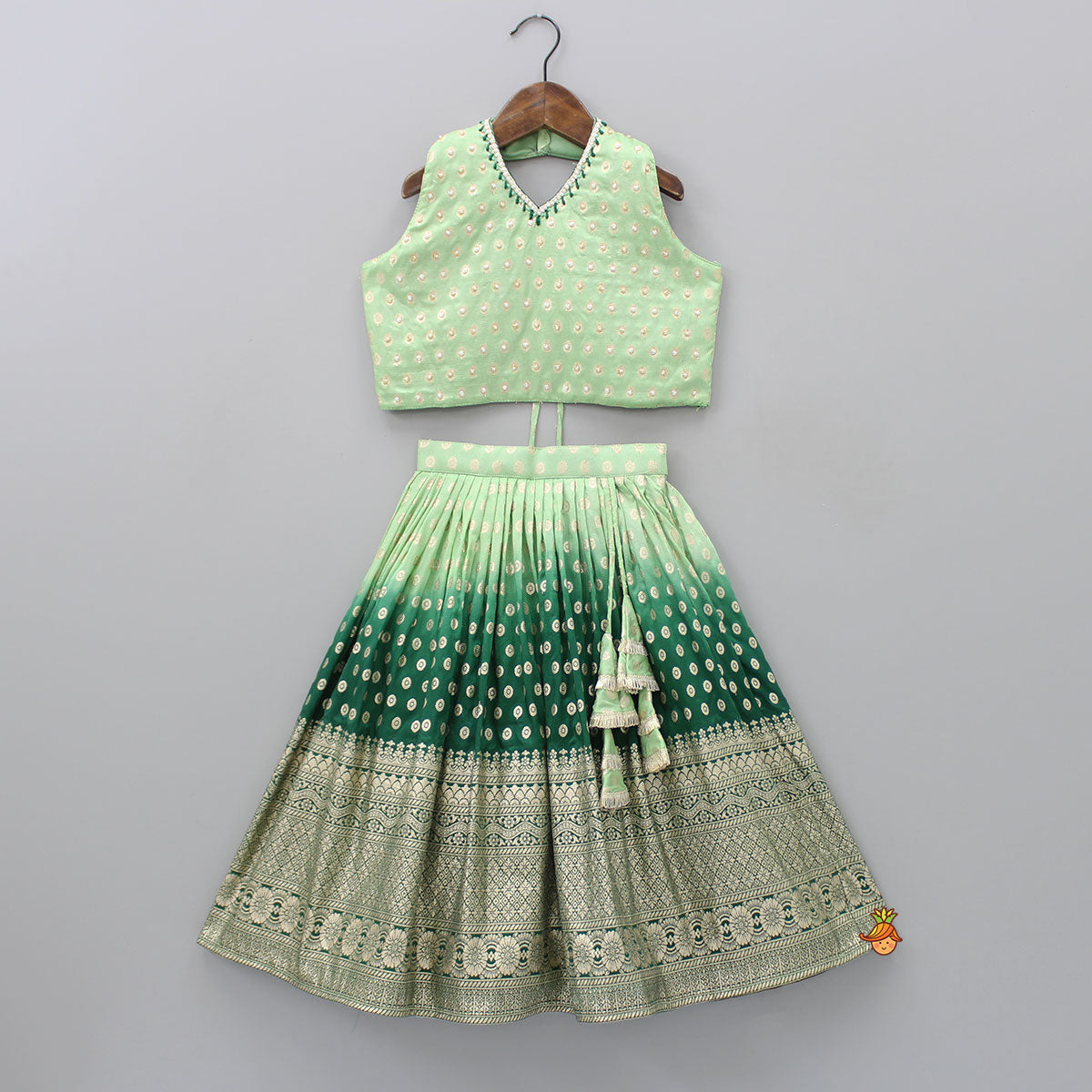 Pre Order: Splendid Embroidered Halter Neck Green Top With Lehenga And Fringed Lace Dupatta