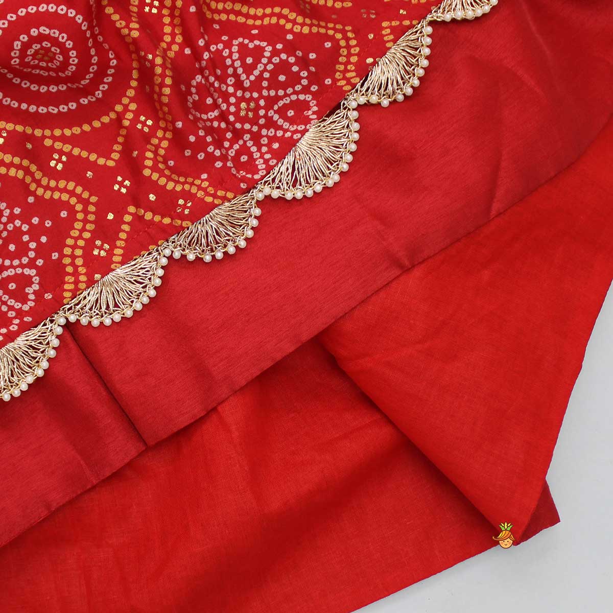 Pre Order: Faux Mirror Work Red Top With Bandhani Printed Lehenga And Dupatta