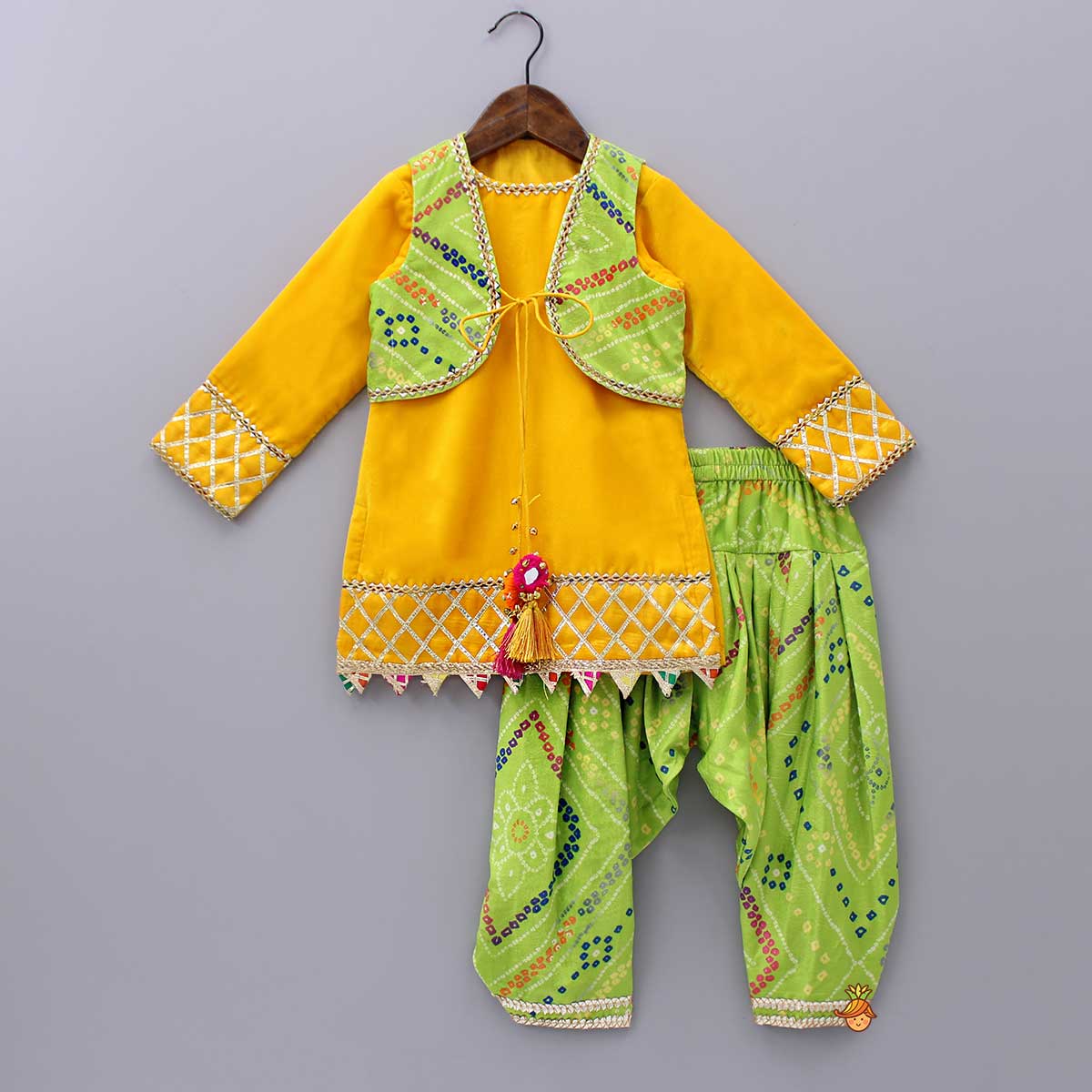 Pre Order: Yellow Velvet Kurti With Bandhani Printed Tie Up Jacket And Salwar With Matching Dupatta