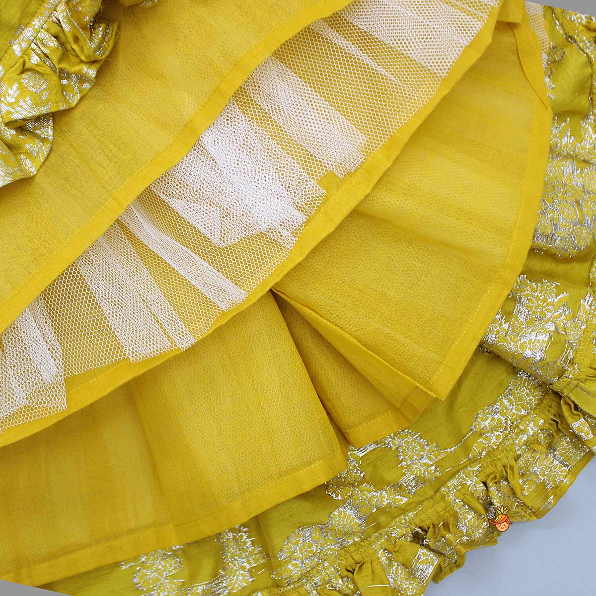 Pre Order: Pleated Armhole Mustard Top And Ruffle Hem Lehenga