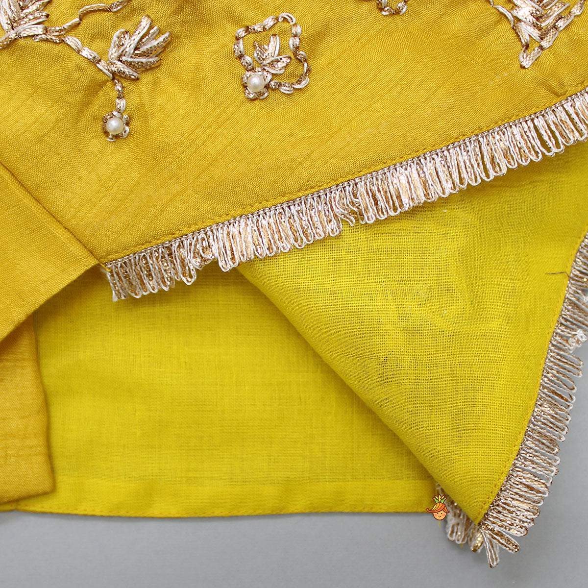 Pre Order: Beautiful Halter Neck Embroidered Mustard Top And Lehenga With Net Dupatta