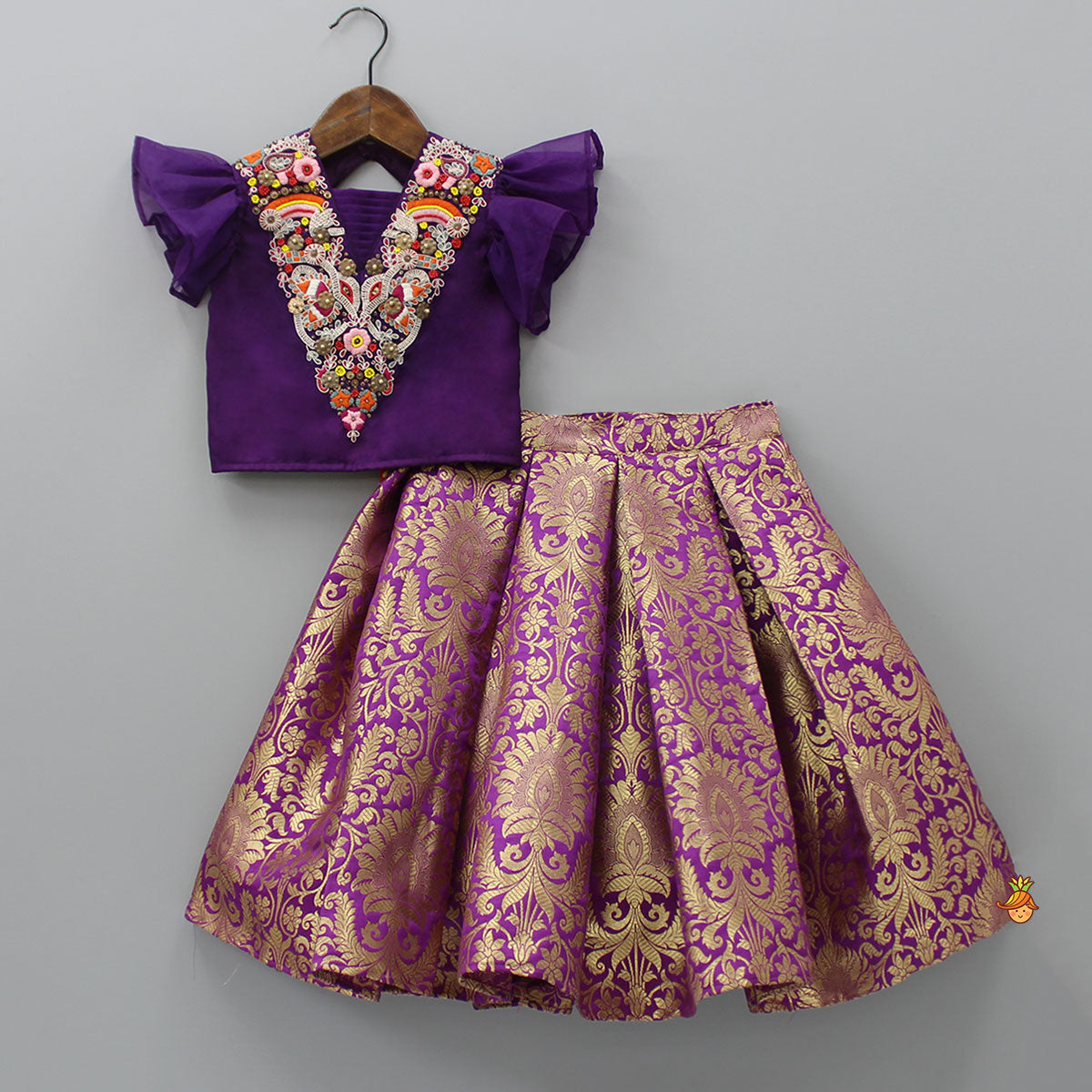 Pre Order: Stylish Cut Out Back Purple Top And Box Pleated Brocade Lehenga