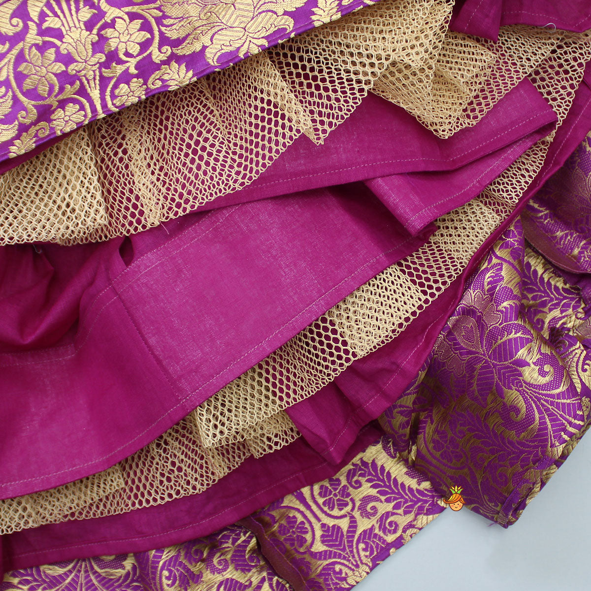 Pre Order: Stylish Cut Out Back Purple Top And Box Pleated Brocade Lehenga