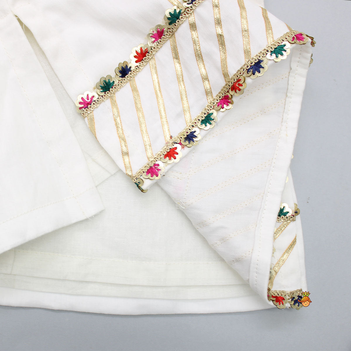 Pre Order: Fringes Detail Yoke Off White Top And Elasticated Hem Salwar With Net Dupatta