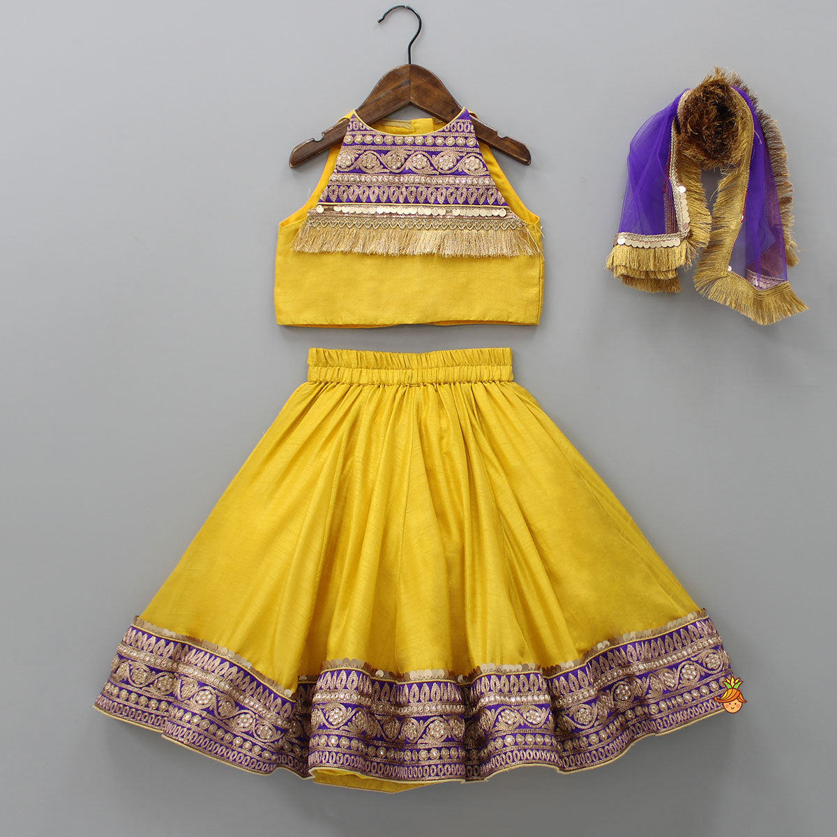 Pre Order: Embroidered Mustard Top And Lehenga With Fringed Net Dupatta