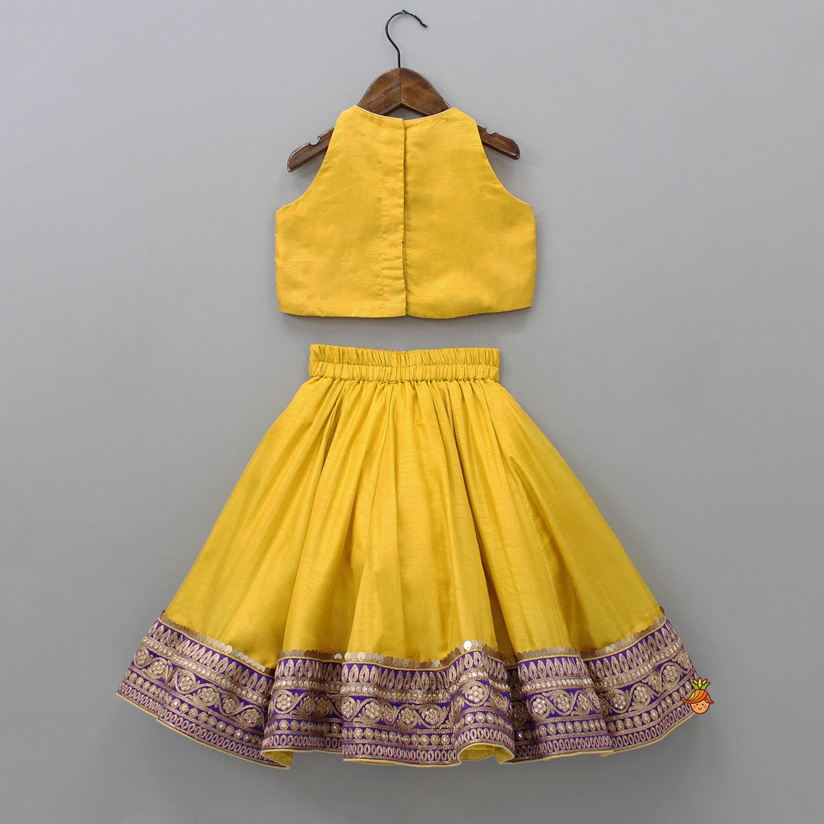 Pre Order: Embroidered Mustard Top And Lehenga With Fringed Net Dupatta