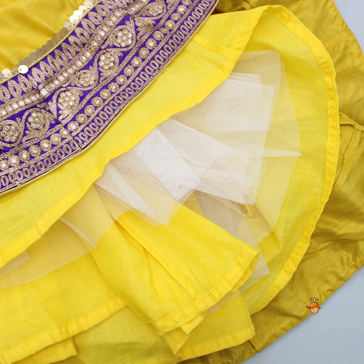 Pre Order: Embroidered Mustard Top And Lehenga With Fringed Net Dupatta